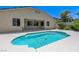 Inviting backyard features a sparkling pool and a covered patio area at 9632 Cherry Canyon Ave, Las Vegas, NV 89129