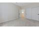 Bedroom featuring plush carpet, access to an adjacent room, and closet with doors at 9632 Cherry Canyon Ave, Las Vegas, NV 89129