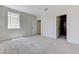 Bright bedroom features neutral walls, plush carpeting, and a convenient walk-in closet at 9632 Cherry Canyon Ave, Las Vegas, NV 89129