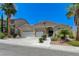 Inviting single-story home with a three-car garage and drought-tolerant landscaping at 9632 Cherry Canyon Ave, Las Vegas, NV 89129