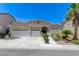 Charming single-story home featuring a three-car garage and well-maintained landscaping at 9632 Cherry Canyon Ave, Las Vegas, NV 89129