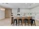 Modern kitchen with stainless steel appliances, center island and breakfast bar seating at 9632 Cherry Canyon Ave, Las Vegas, NV 89129