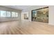 Expansive living room with open floor plan and built-in mirrored bar at 9632 Cherry Canyon Ave, Las Vegas, NV 89129