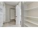 Spacious walk-in closet with custom shelves and cabinets for organization at 9632 Cherry Canyon Ave, Las Vegas, NV 89129