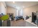Cozy bedroom with a bed, desk, and window for natural light at , Henderson, NV 89044