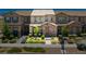 Charming townhome with stone accents, lush landscaping, and a welcoming entrance at , Henderson, NV 89044