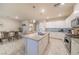 Spacious kitchen with granite island overlooking dining area, featuring modern appliances at , Henderson, NV 89044