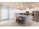 Modern kitchen with white cabinetry, granite countertops, and stainless steel appliances at , Henderson, NV 89044