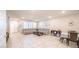 Bright and airy living room with neutral decor and a connected dining area at , Henderson, NV 89044