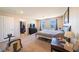 Spacious main bedroom featuring two windows, carpet and black furniture set at , Henderson, NV 89044