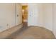 Bedroom with a neutral wall color, carpet, and an open door at 10348 Cherry Brook St, Las Vegas, NV 89183