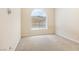 Bedroom featuring a window, neutral wall color, and wall-to-wall carpeting at 10348 Cherry Brook St, Las Vegas, NV 89183