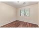 Bright bedroom features lovely hard wood flooring, and a ceiling fan at 10584 Peach Creek St, Las Vegas, NV 89179
