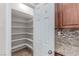 Walk-in pantry offers ample storage space with built-in shelving at 10584 Peach Creek St, Las Vegas, NV 89179