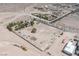 Large lot with potential, showcasing mature trees and current construction at 1106 E Athens Ave, Henderson, NV 89015