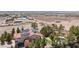 Overhead shot showcasing home with solar panels, mature trees, and desert landscape at 1106 E Athens Ave, Henderson, NV 89015