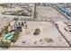 Aerial view showcasing the property with a large lot, pool, house and established landscaping at 1106 E Athens Ave, Henderson, NV 89015