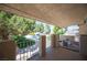 A covered porch with view of the backyard pool area at 1106 E Athens Ave, Henderson, NV 89015