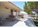 Back porch featuring an outdoor barbeque, stairs, and desert landscaping at 1106 E Athens Ave, Henderson, NV 89015