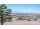 Spacious lot with desert plants and skyline view of Las Vegas at 1106 E Athens Ave, Henderson, NV 89015