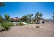 Large backyard with desert landscaping, pool, and mountain views at 1106 E Athens Ave, Henderson, NV 89015