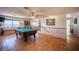Bright and airy living space with terracotta floors, offering ample room for relaxation and recreation at 1106 E Athens Ave, Henderson, NV 89015