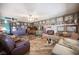 Comfortable living room with fireplace, offering a warm and inviting atmosphere at 1106 E Athens Ave, Henderson, NV 89015