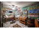Office area featuring wood desk, decor and memorabilia at 1106 E Athens Ave, Henderson, NV 89015