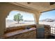 Outdoor kitchen featuring stone accents, a built-in grill, and stunning views at 1106 E Athens Ave, Henderson, NV 89015