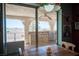 Covered outdoor patio with a built-in barbecue, offering views of the surrounding landscape at 1106 E Athens Ave, Henderson, NV 89015