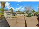 Backyard featuring a detached garage, fence and foliage at 1804 David Ave, Las Vegas, NV 89101
