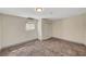 Cozy bedroom with neutral carpet, light walls and natural light at 1804 David Ave, Las Vegas, NV 89101