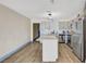 Modern kitchen island is well-lit with pendant lights, and features stainless appliances at 1804 David Ave, Las Vegas, NV 89101