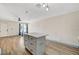 Open concept shows kitchen with island and view to the living area at 1804 David Ave, Las Vegas, NV 89101