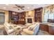 Living room boasts a fireplace, custom built-in shelving, comfortable seating, and a stylish coffee table at 1844 Winners Cup Drive, Las Vegas, NV 89117