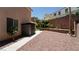 Spacious backyard featuring a storage shed, minimalist landscaping, and privacy wall at 2017 Shining Feather Ln, Las Vegas, NV 89134