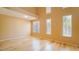 Well-lit living room with hardwood floors and an abundance of natural light at 2017 Shining Feather Ln, Las Vegas, NV 89134