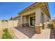 Relaxing back patio with pavers, access to the home through sliding glass doors at 209 Bennett Pointe Ave, Henderson, NV 89011