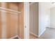 A walk-in closet with a shelf for storage in a home at 2111 Hollow Oak Ave, North Las Vegas, NV 89031
