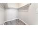 A simple closet with shelving and a hanging rod at 2111 Hollow Oak Ave, North Las Vegas, NV 89031