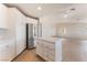 Bright and spacious kitchen living room area featuring a kitchen island and stainless appliances at 2111 Hollow Oak Ave, North Las Vegas, NV 89031