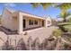 Backyard features a patio and a well-maintained landscape at 2131 Waterton Rivers Dr, Henderson, NV 89044
