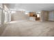 Open-concept living area, neutral palette, flowing seamlessly into the kitchen at 2131 Waterton Rivers Dr, Henderson, NV 89044