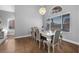 Bright dining room featuring natural light, modern decor, and seating for six at 2204 W San Miguel Ave, North Las Vegas, NV 89032