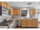 Functional kitchen with stainless steel appliances and ample cabinet space for storage at 2204 W San Miguel Ave, North Las Vegas, NV 89032