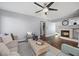 Inviting living room features a fireplace and seamless access to other areas of the home at 2204 W San Miguel Ave, North Las Vegas, NV 89032