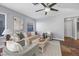 Comfortable living room offering natural light, modern decor, and a ceiling fan at 2204 W San Miguel Ave, North Las Vegas, NV 89032