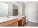 Bathroom features a double sink vanity with tiled shower and floors at 224 Morgyn Ln # 6, Boulder City, NV 89005