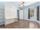 Bedroom features a built-in Murphy bed, shelves, and windows at 224 Morgyn Ln # 6, Boulder City, NV 89005