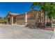 Charming home with a two-car garage, tile roof, and well-maintained landscaping at 224 Morgyn Ln # 6, Boulder City, NV 89005
